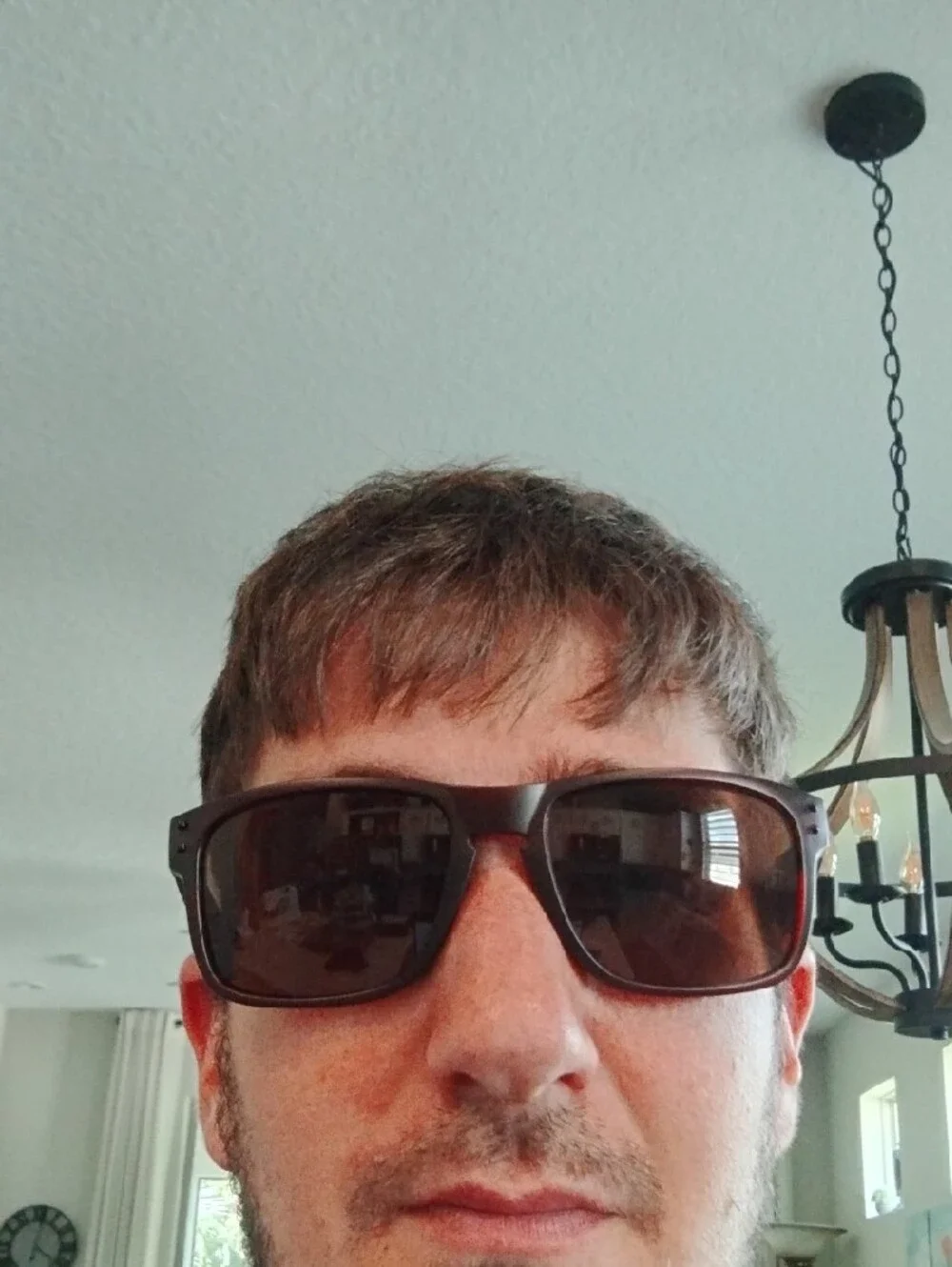 Oakley Brown Frame Sunglasses with Dark Lenses